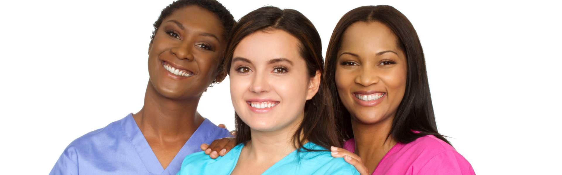 Three female caregivers smiling